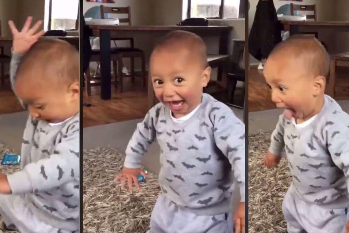 Baby dancing and smiling